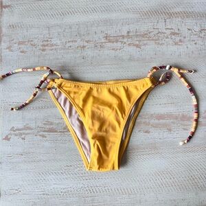 Yellow string bikini bottoms